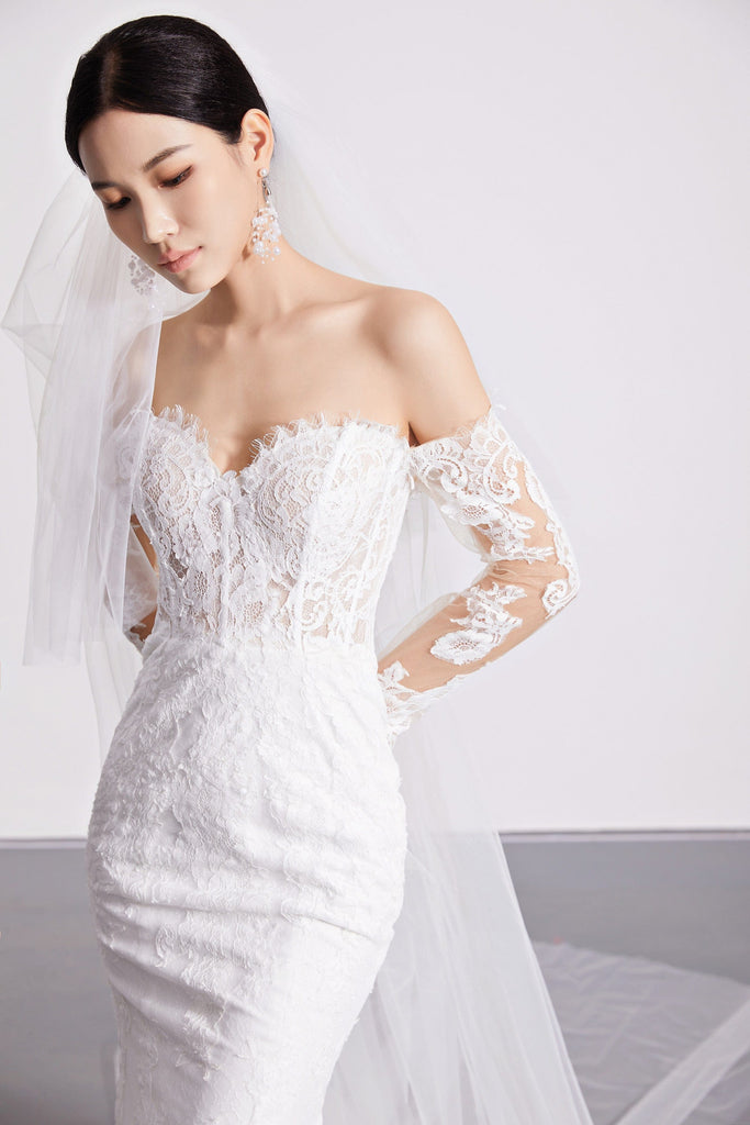 white lace long sleeve wedding dress